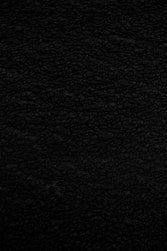 black textile in close up photography