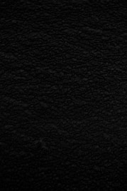 black textile in close up photography