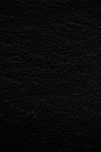 black textile in close up photography