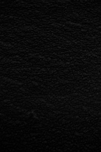 black textile in close up photography