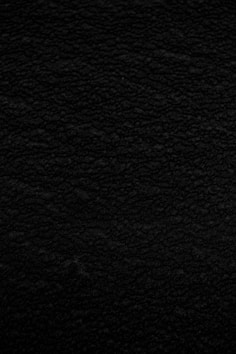 black textile in close up photography