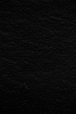 black textile in close up photography