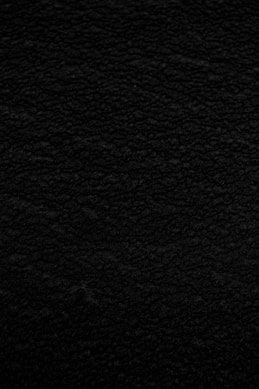 black textile in close up photography