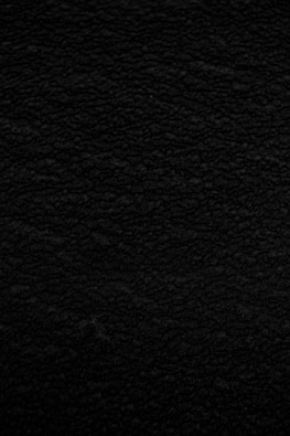 black textile in close up photography