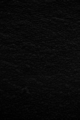 black textile in close up photography