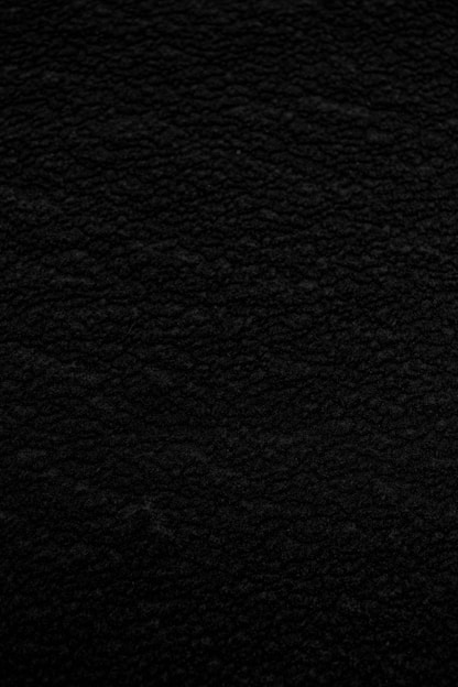 black textile in close up photography