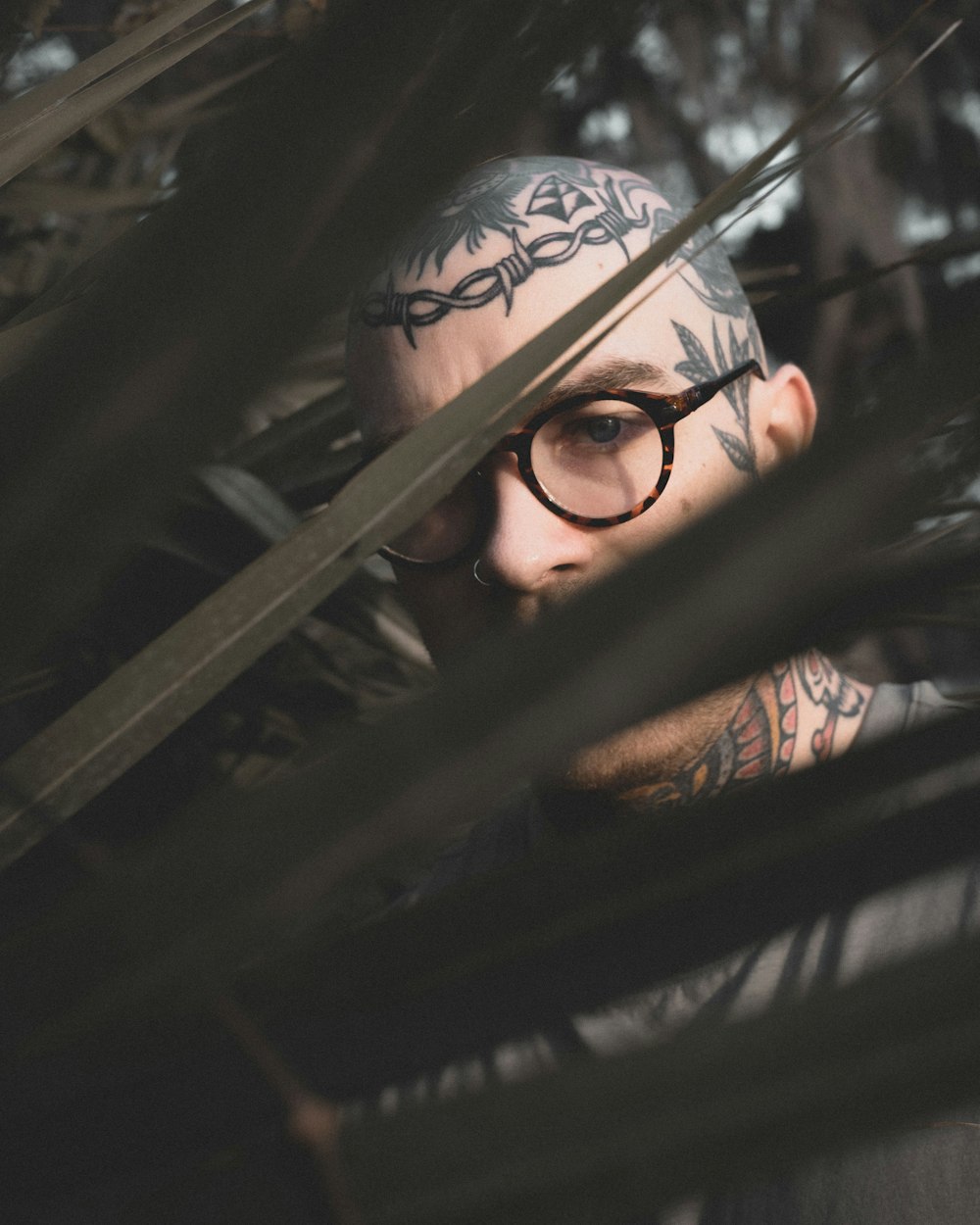 man in black framed eyeglasses