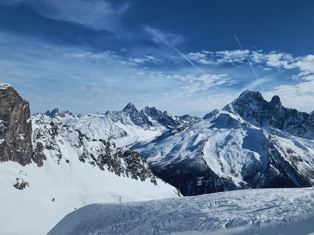 snow covered mountain under blue sky during daytime