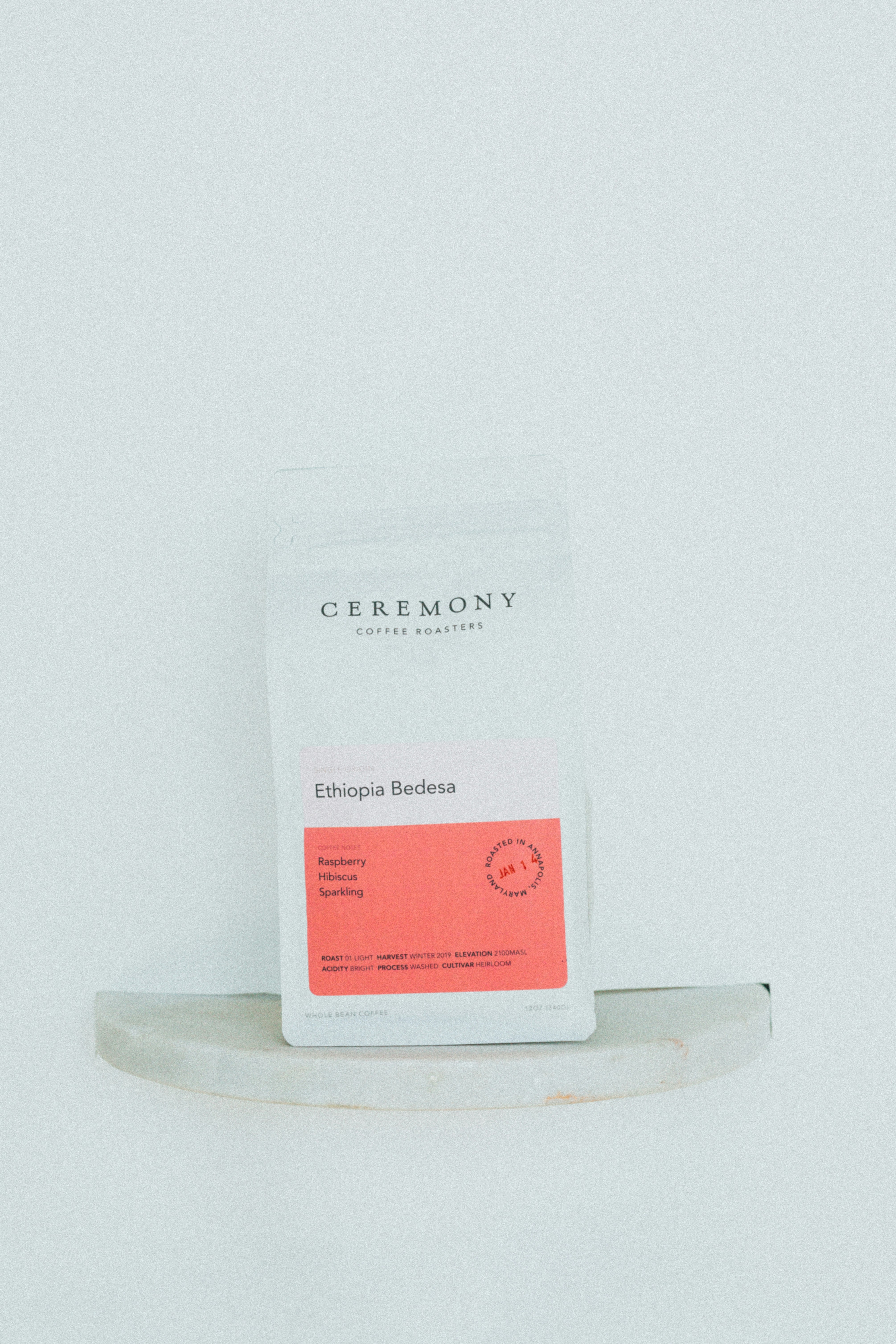 white and red plastic bottle