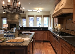 brown wooden kitchen cabinet with sink