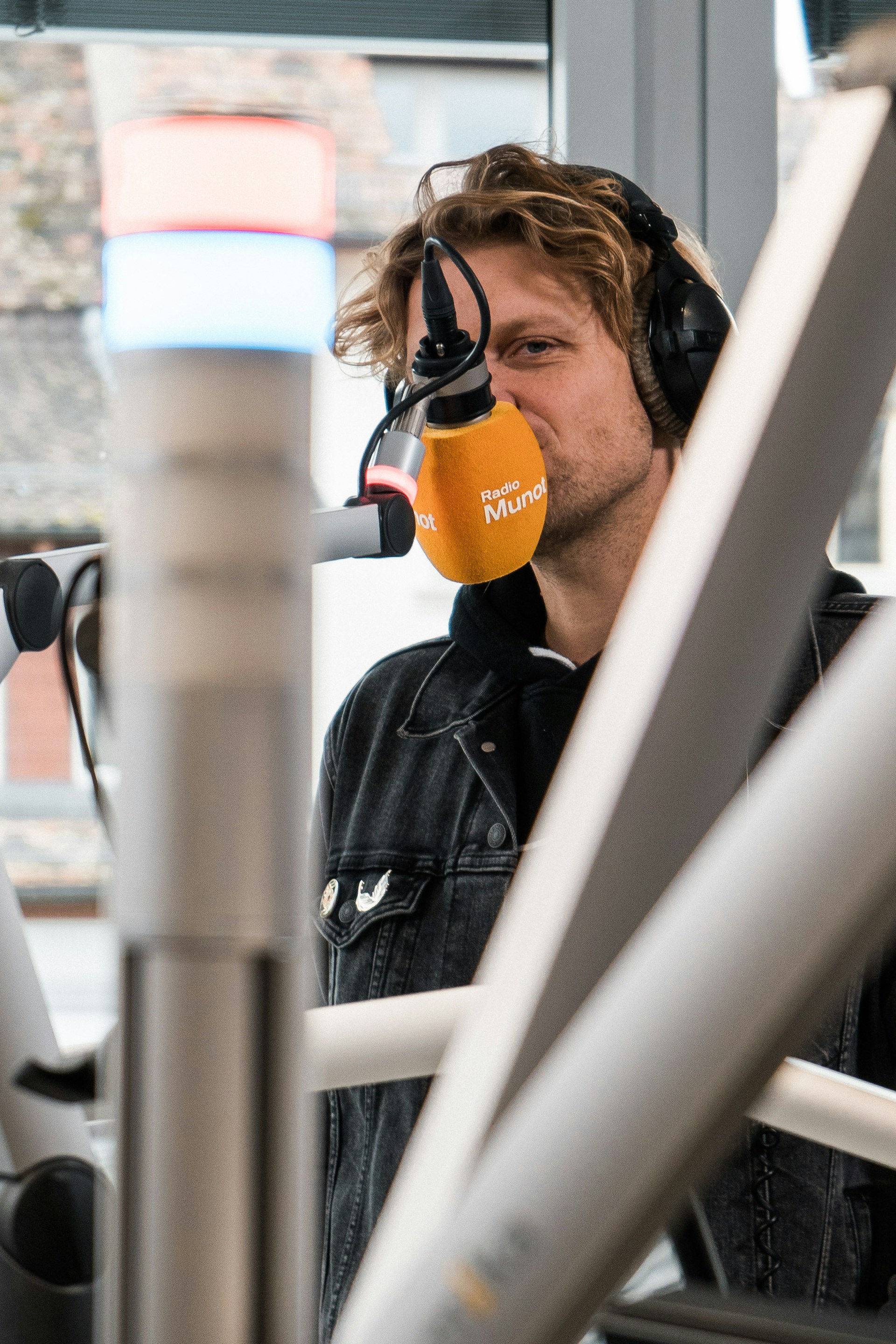 man in black jacket wearing black sunglasses