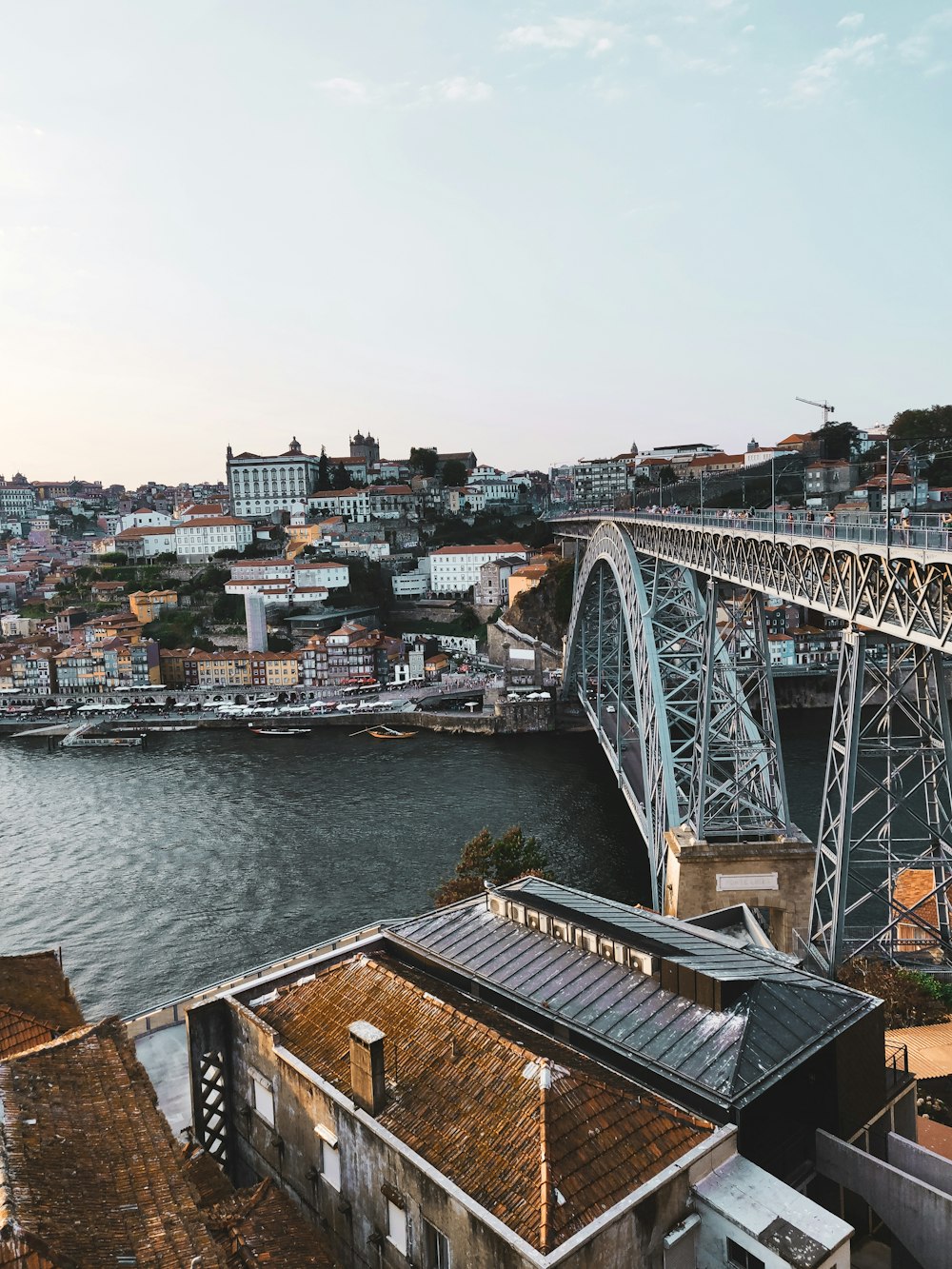 gray metal bridge over river