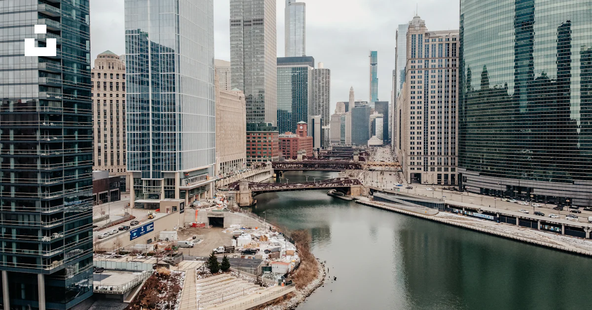 High rise buildings near river during daytime photo – Free Grey Image ...