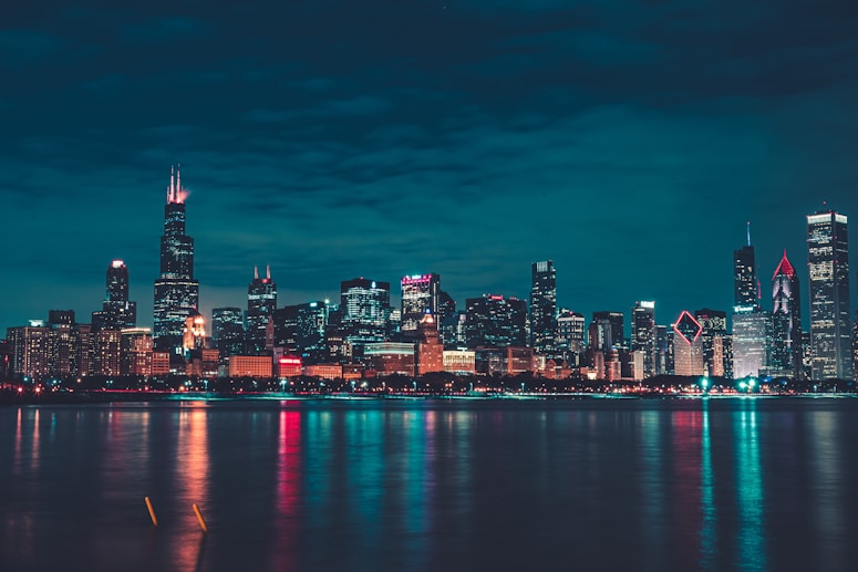 city skyline during night time