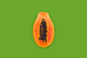yellow and brown fruit with green background