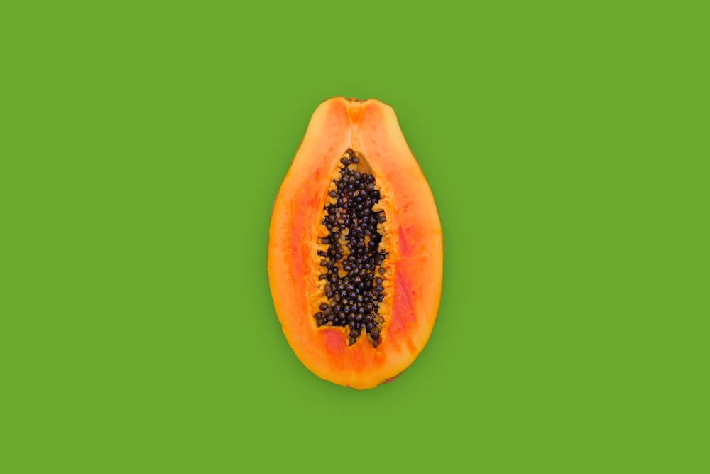 yellow and brown fruit with green background