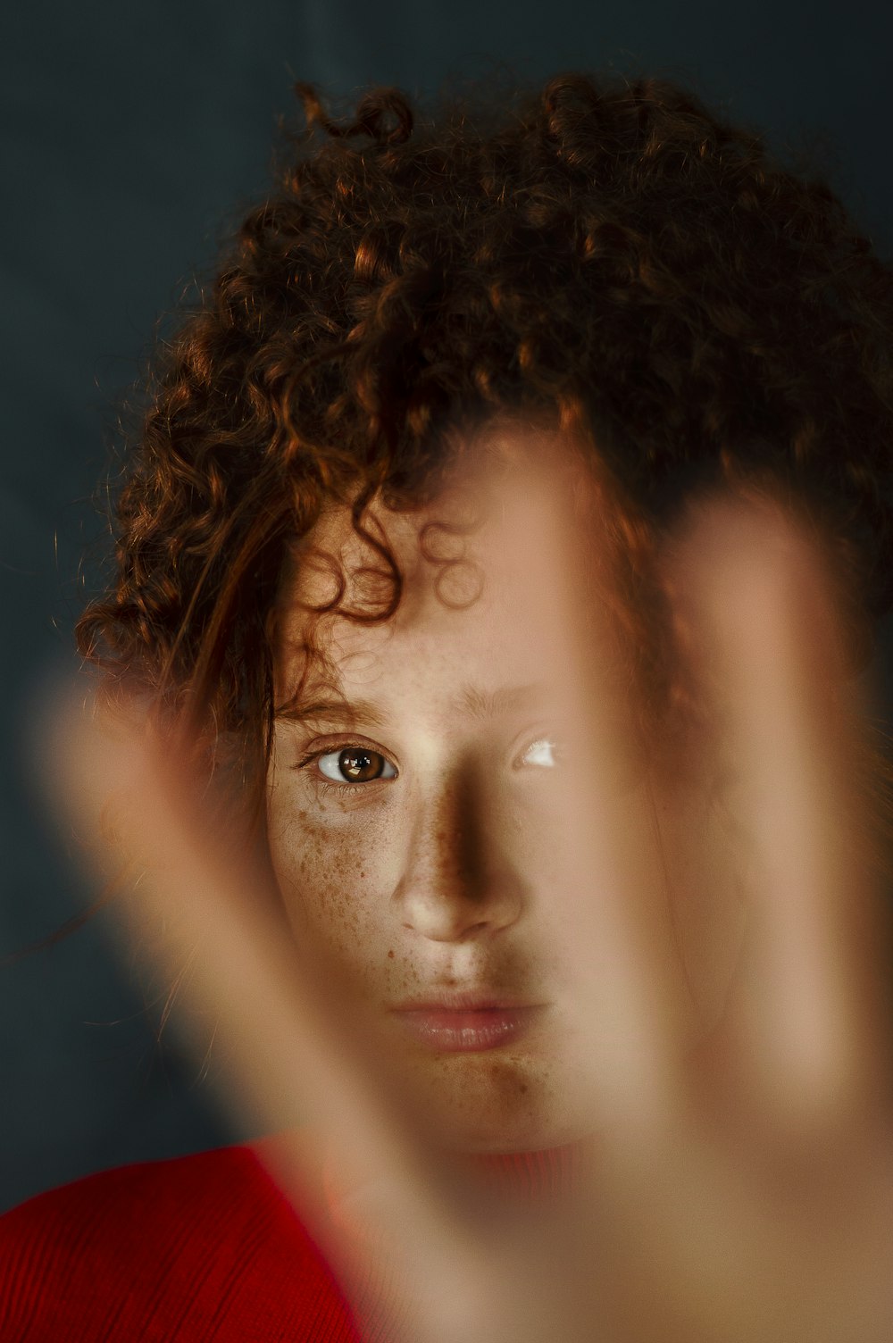 woman with brown curly hair