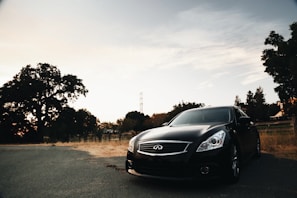 black mercedes benz coupe on road during daytime