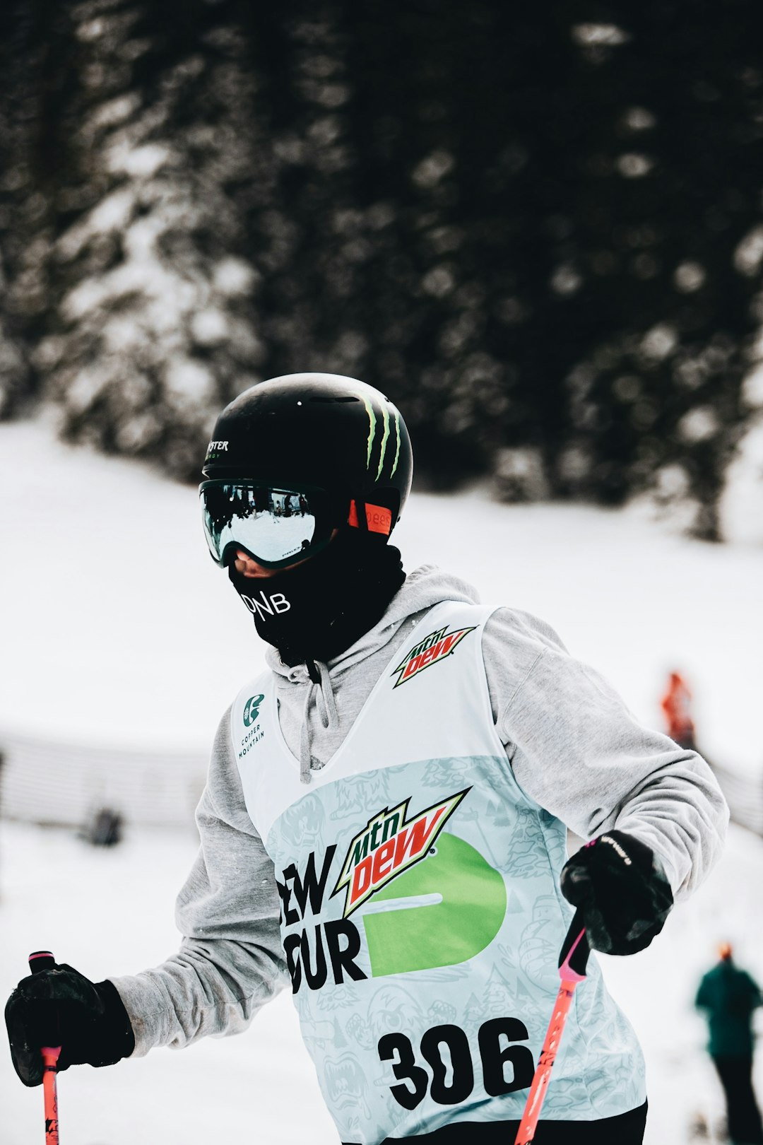 man in white and red jacket riding on black and red snow ski board during daytime