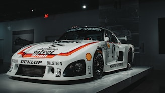 white and red porsche 911