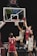 basketball players in red jersey shirt