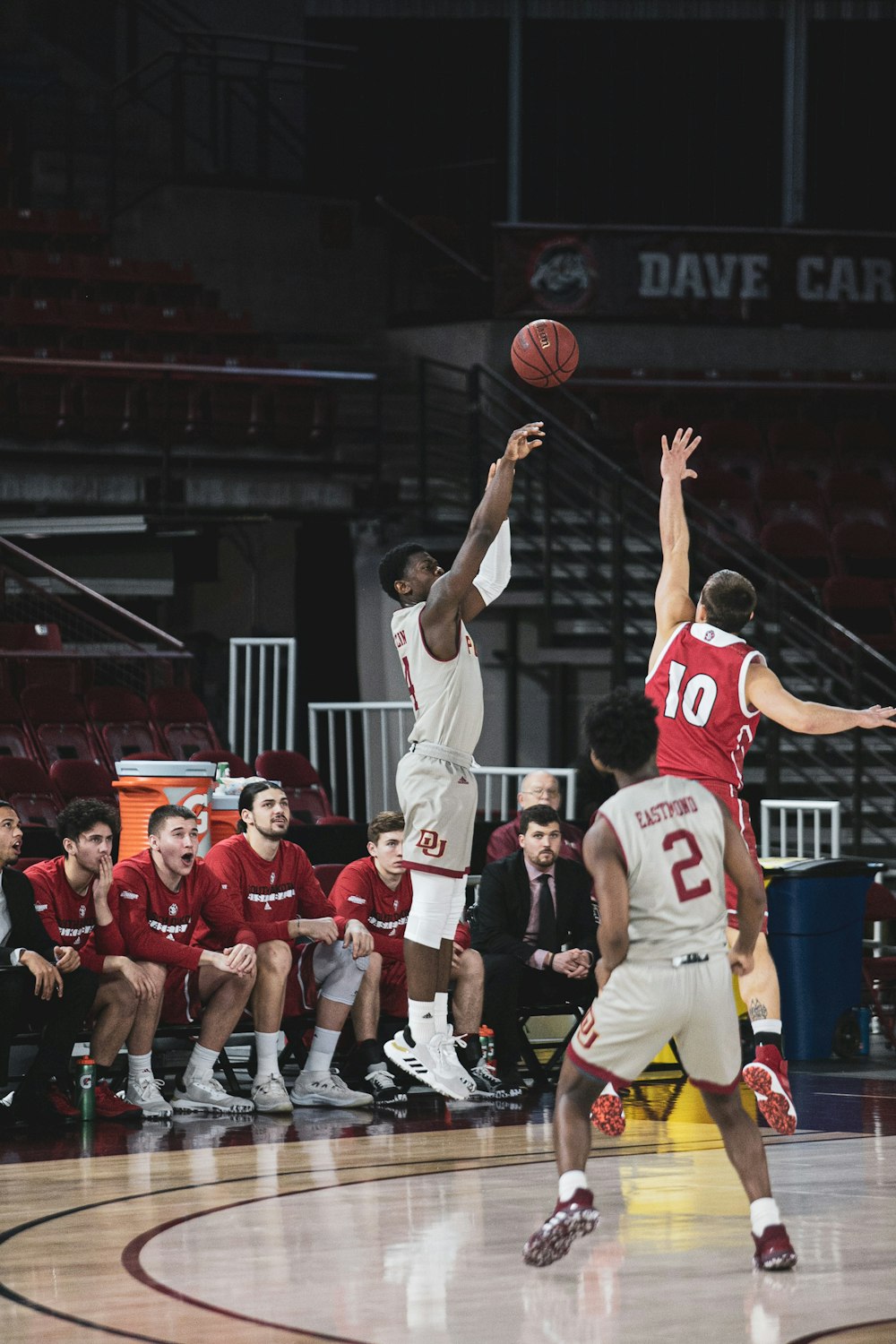 group of people playing basketball