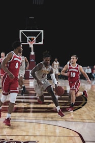 man in black and red basketball jersey shirt