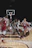 man in black and red basketball jersey shirt