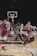 man in black and red basketball jersey shirt