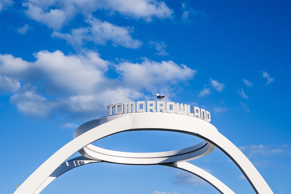 white and blue round frame under blue sky during daytime