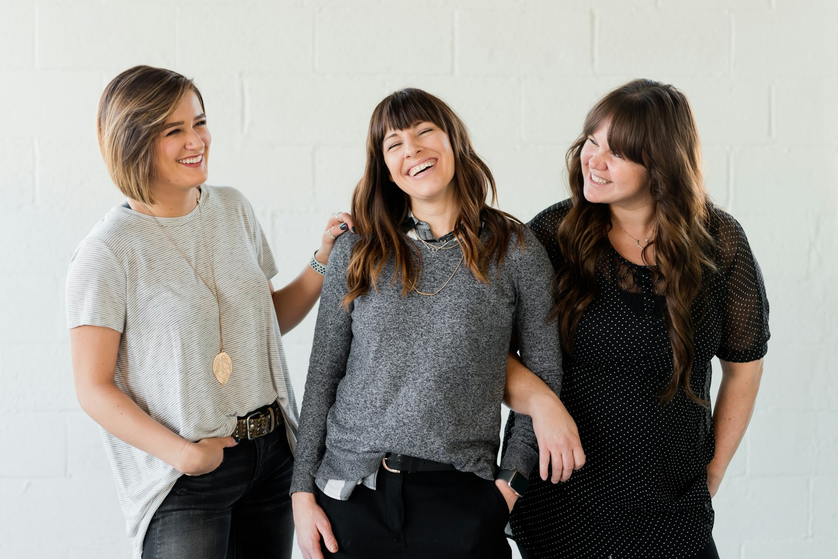 Three smiling women