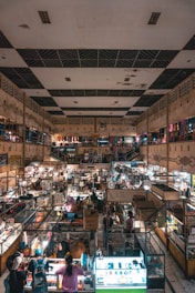 people in store with assorted items