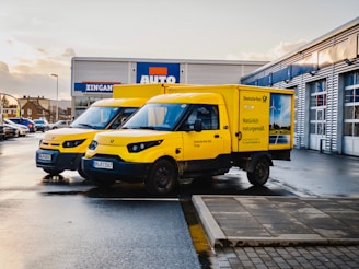 yellow and blue van on road during daytime