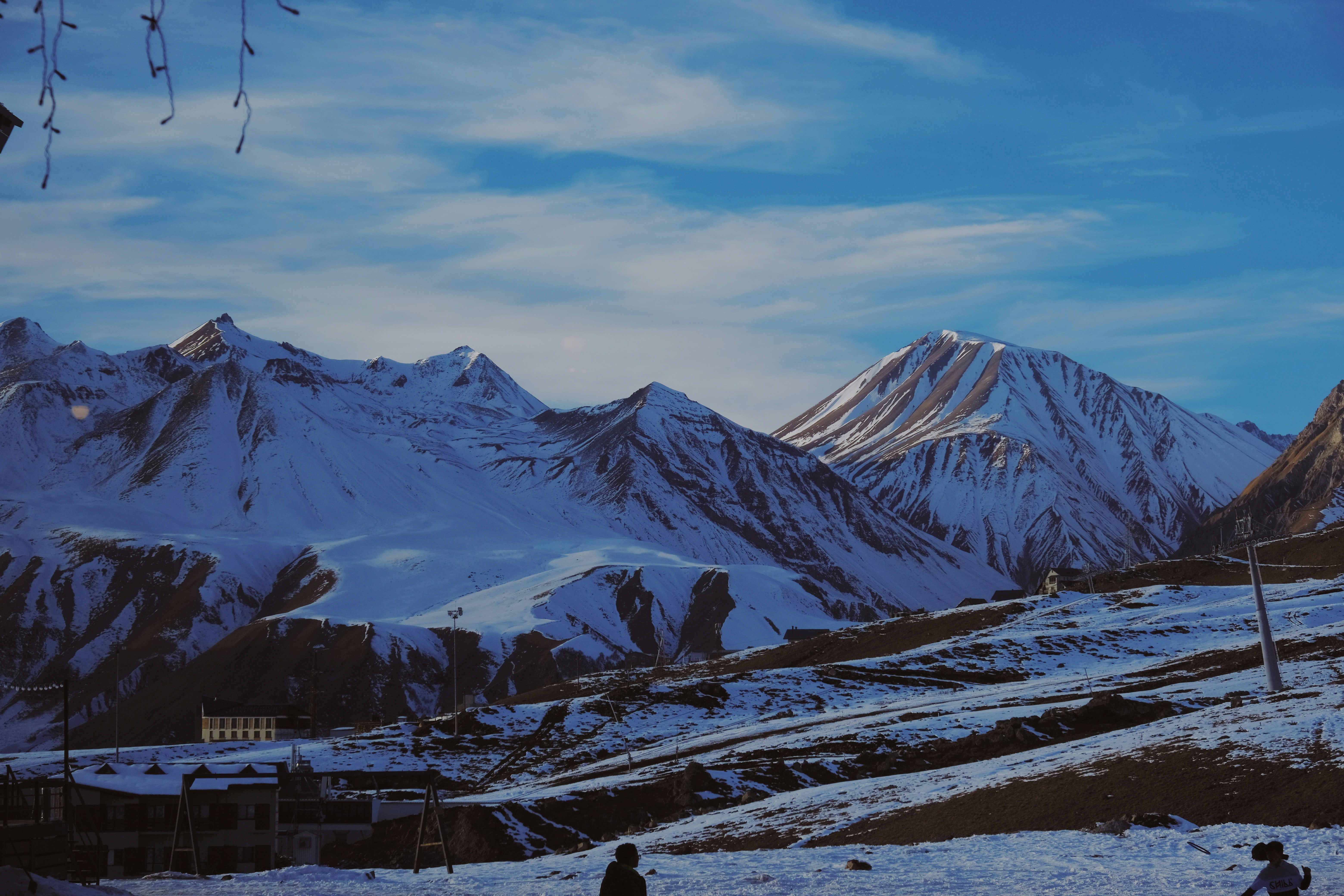 snow covered mountain under cloudy sky during daytime, 