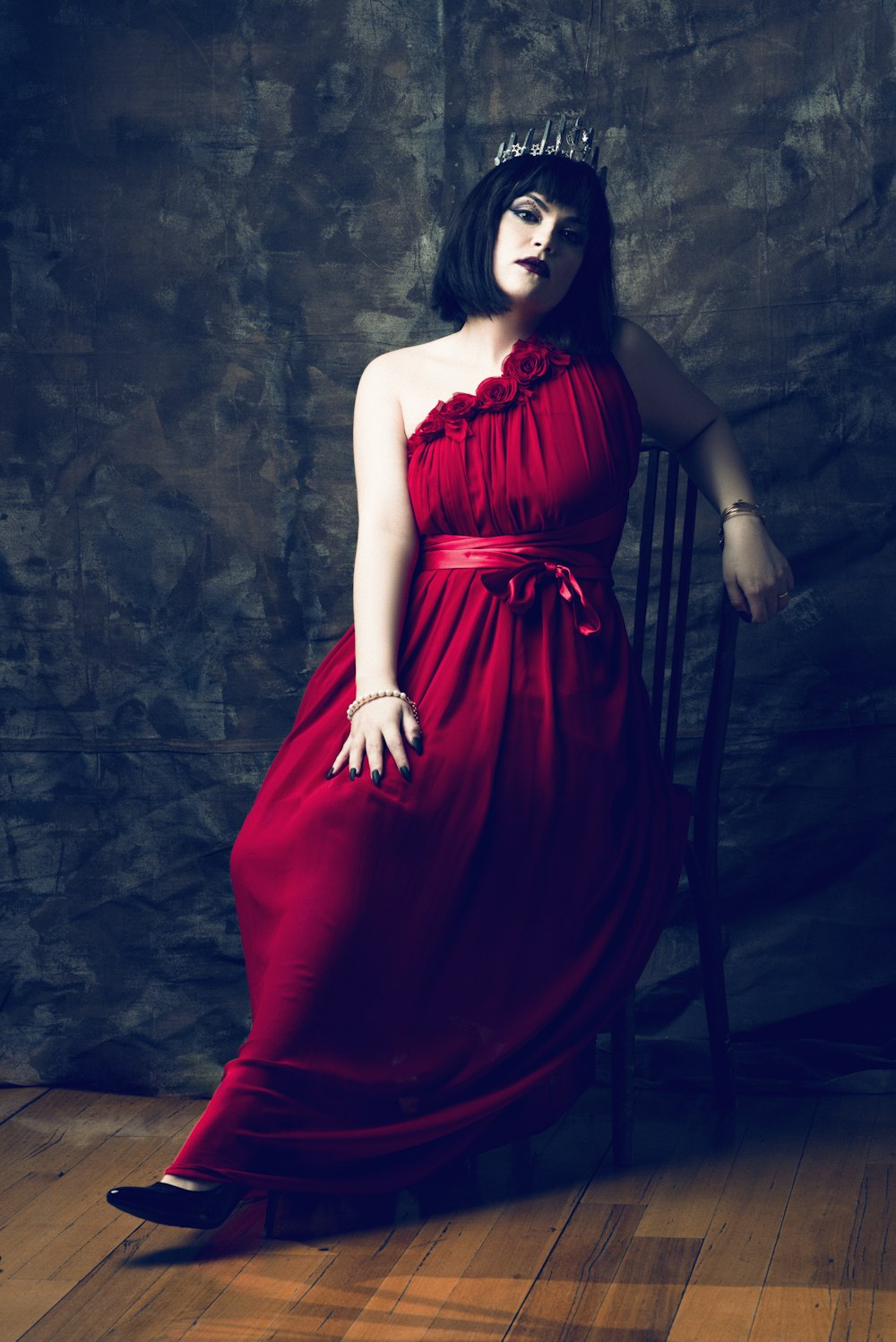 woman in red sleeveless dress