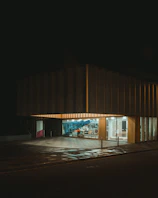 Commercial space storefront with bright signage and wide windows