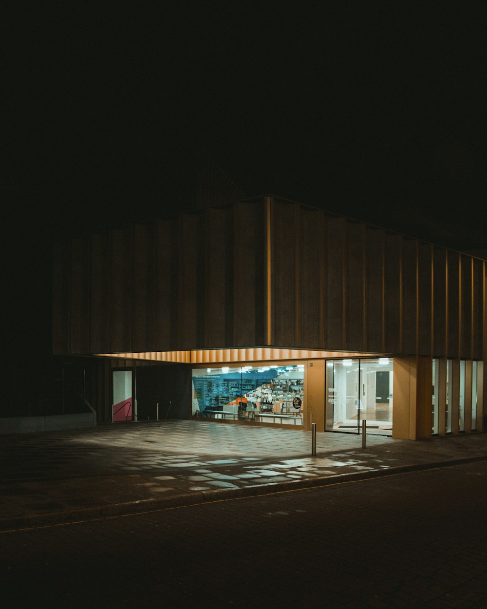 brown and white building during night time