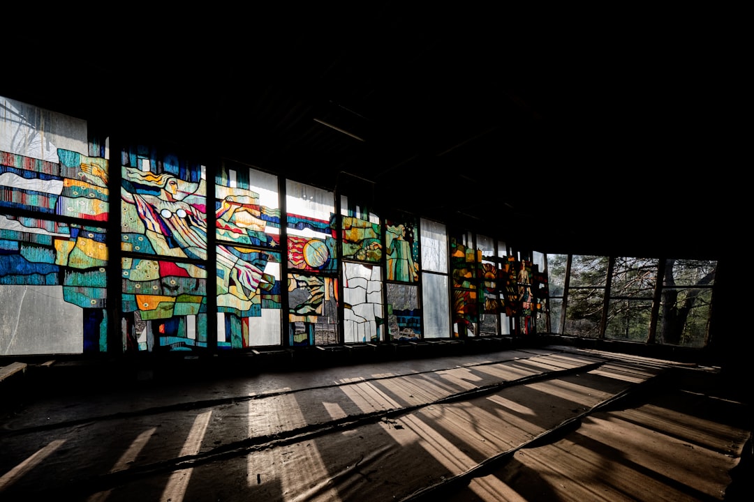 blue green and yellow floral glass window