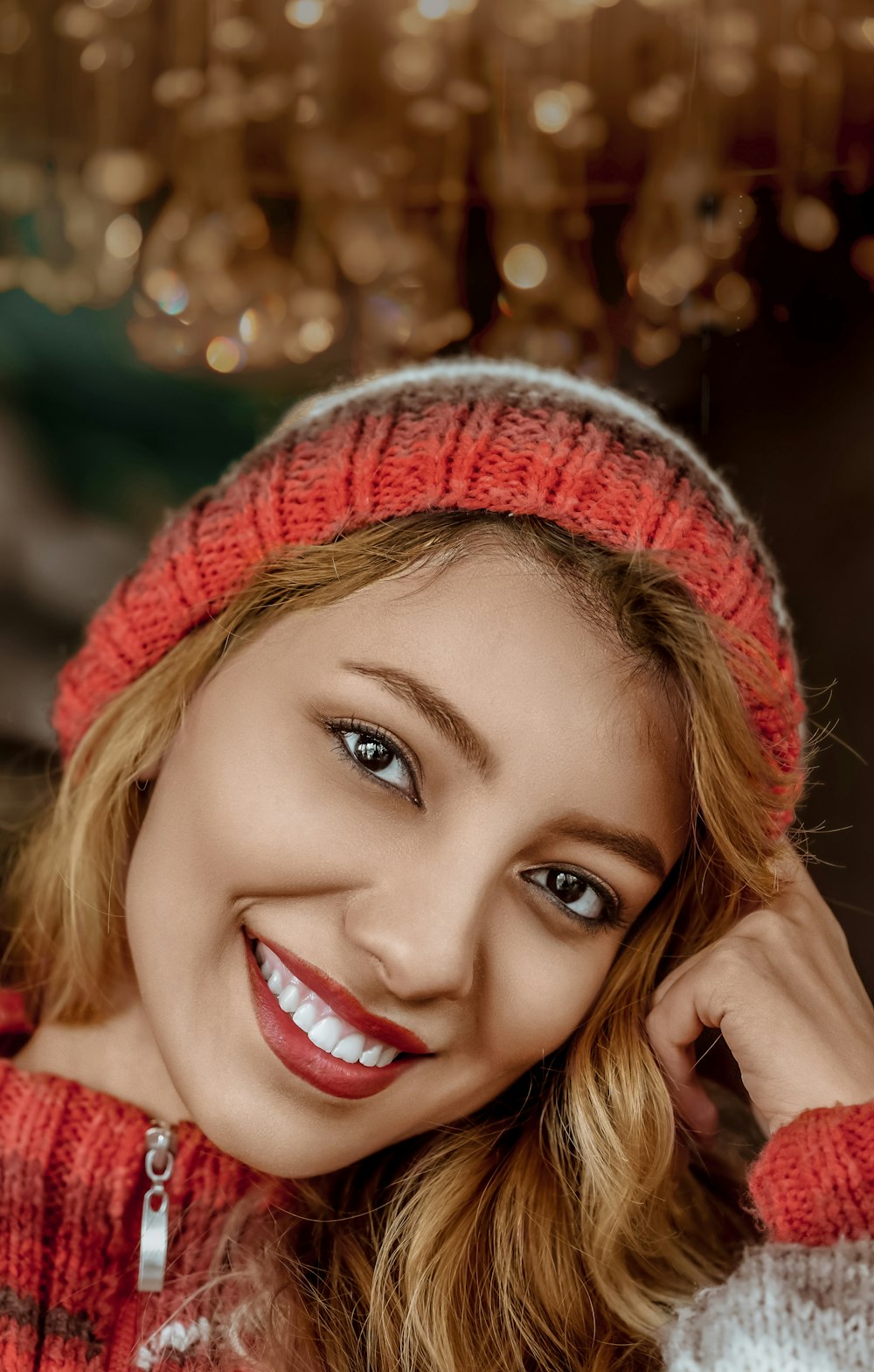 woman in red knit cap