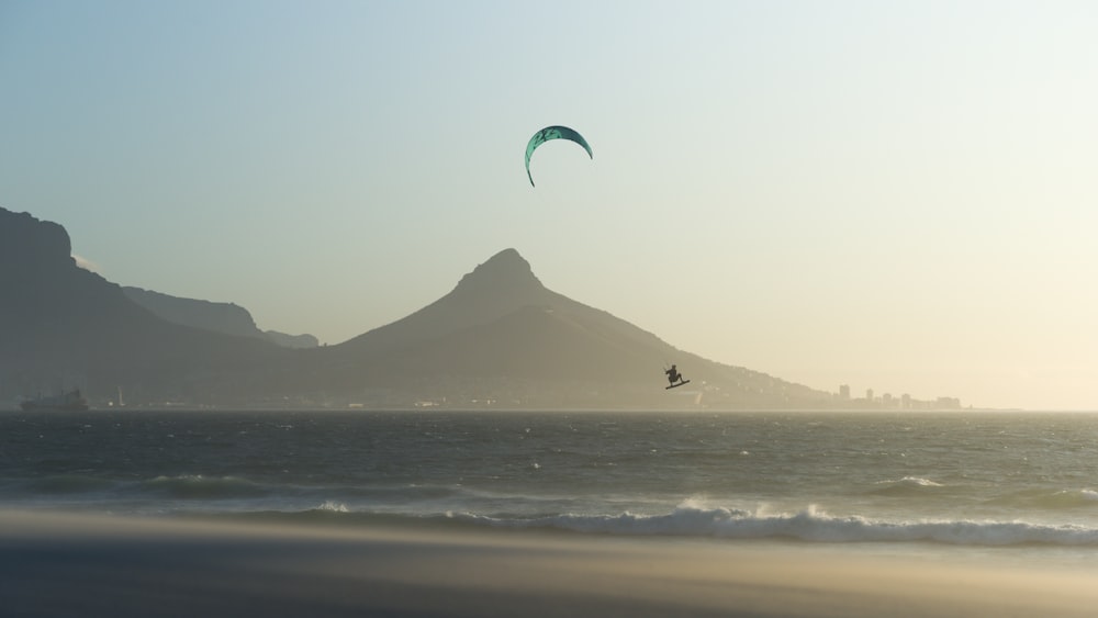 person surfing on sea during daytime