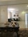 A stylish living room showcasing unique handmade decorative items on a coffee table.