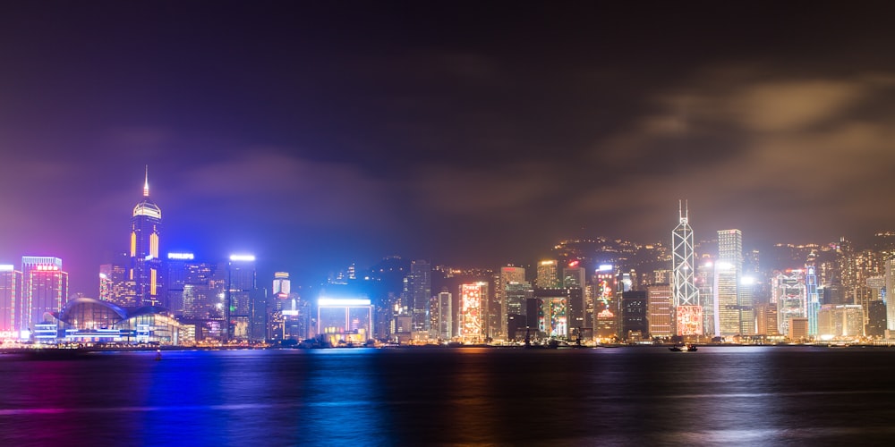 city skyline during night time