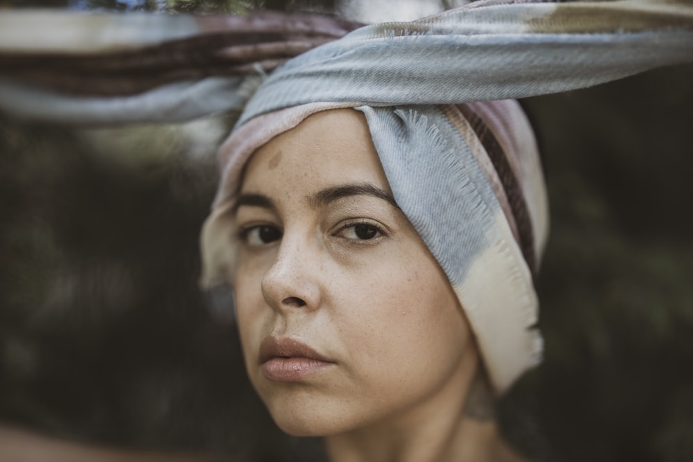 woman in white and blue hijab