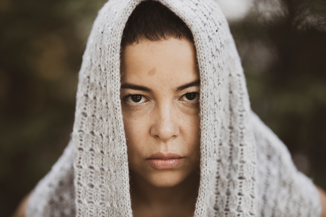 woman in white knit scarf