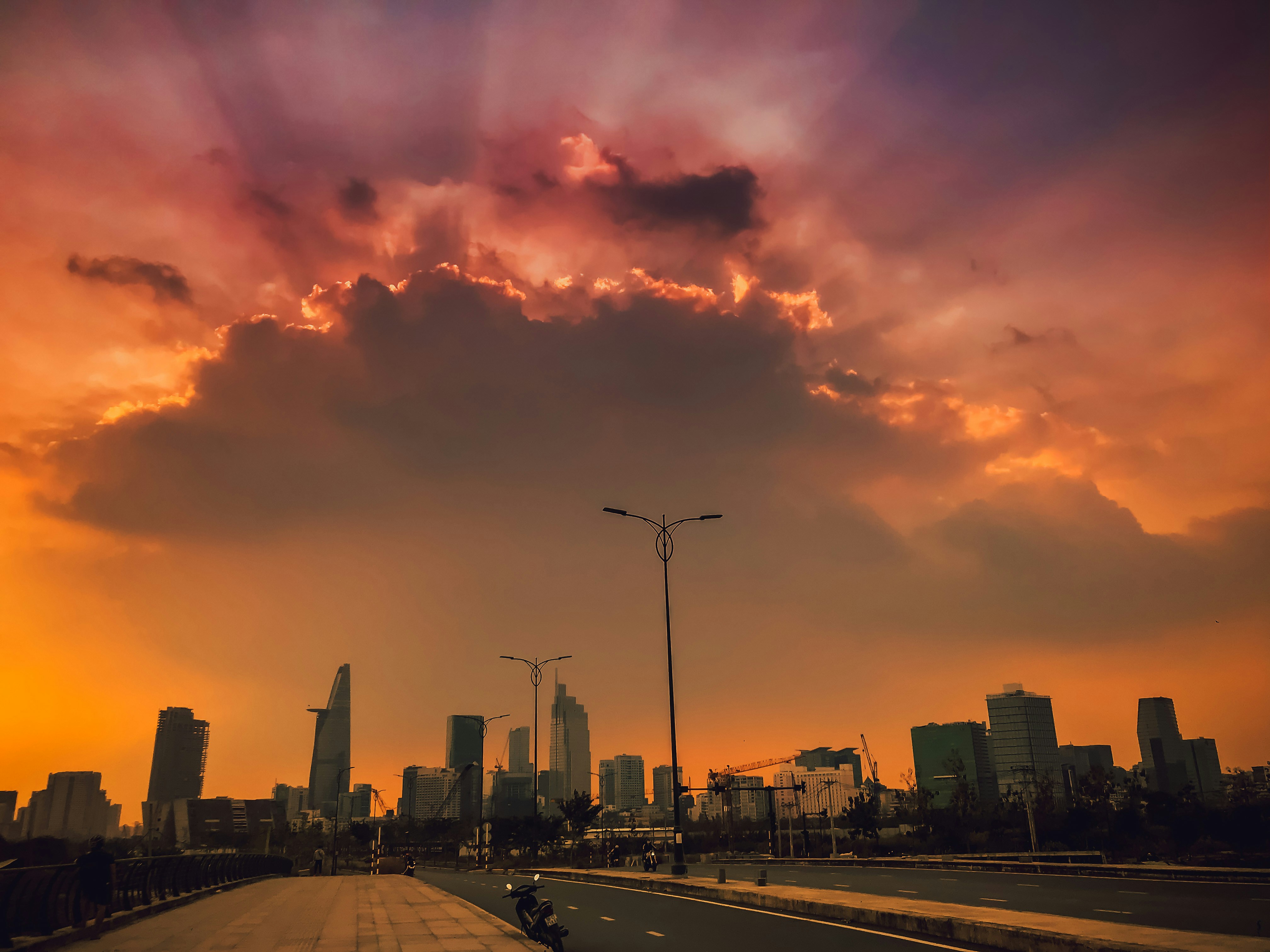 City buildings under cloudy sky during sunset photo – Free Ho chi minh ...