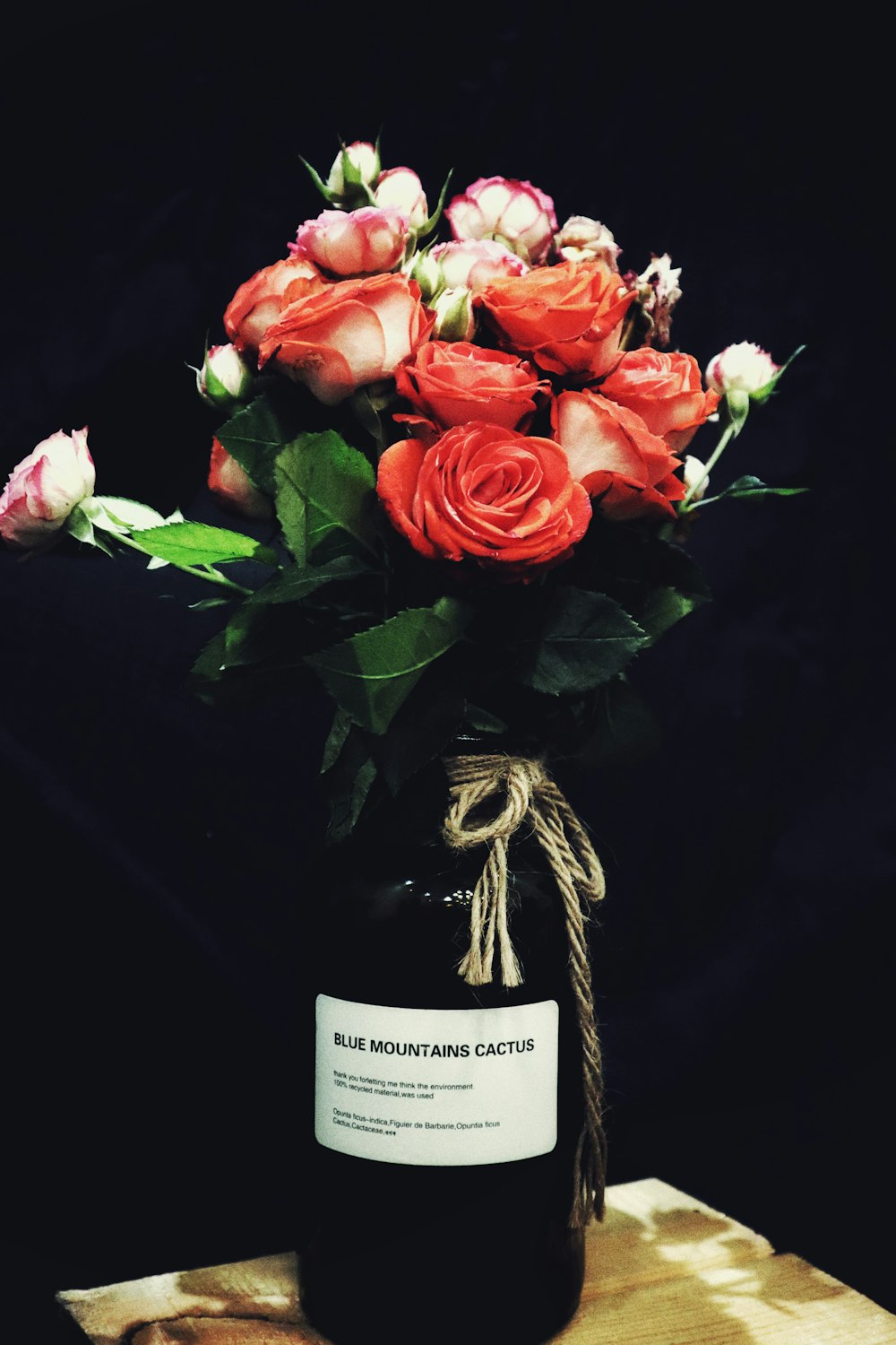 red roses in brown wicker basket