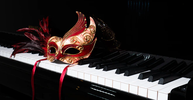 A vintage opera mask resting on a velvet cushion, symbolizing the spirit of Cavalleria Rusticana.