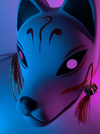 A playful animal costume with a soft, furry mask resembling a fox.