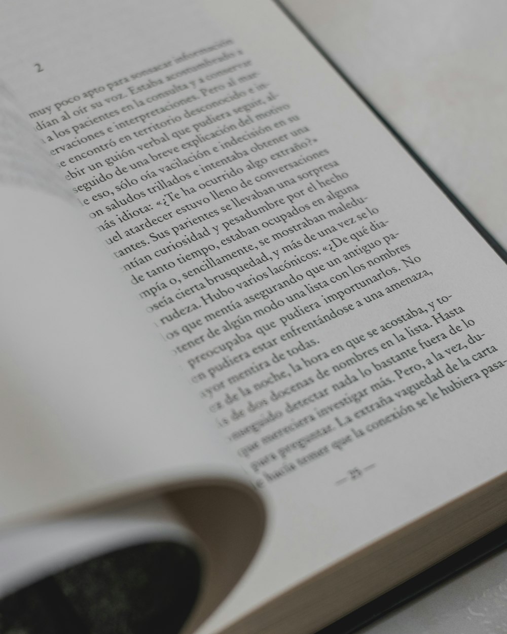 white book page on brown wooden table