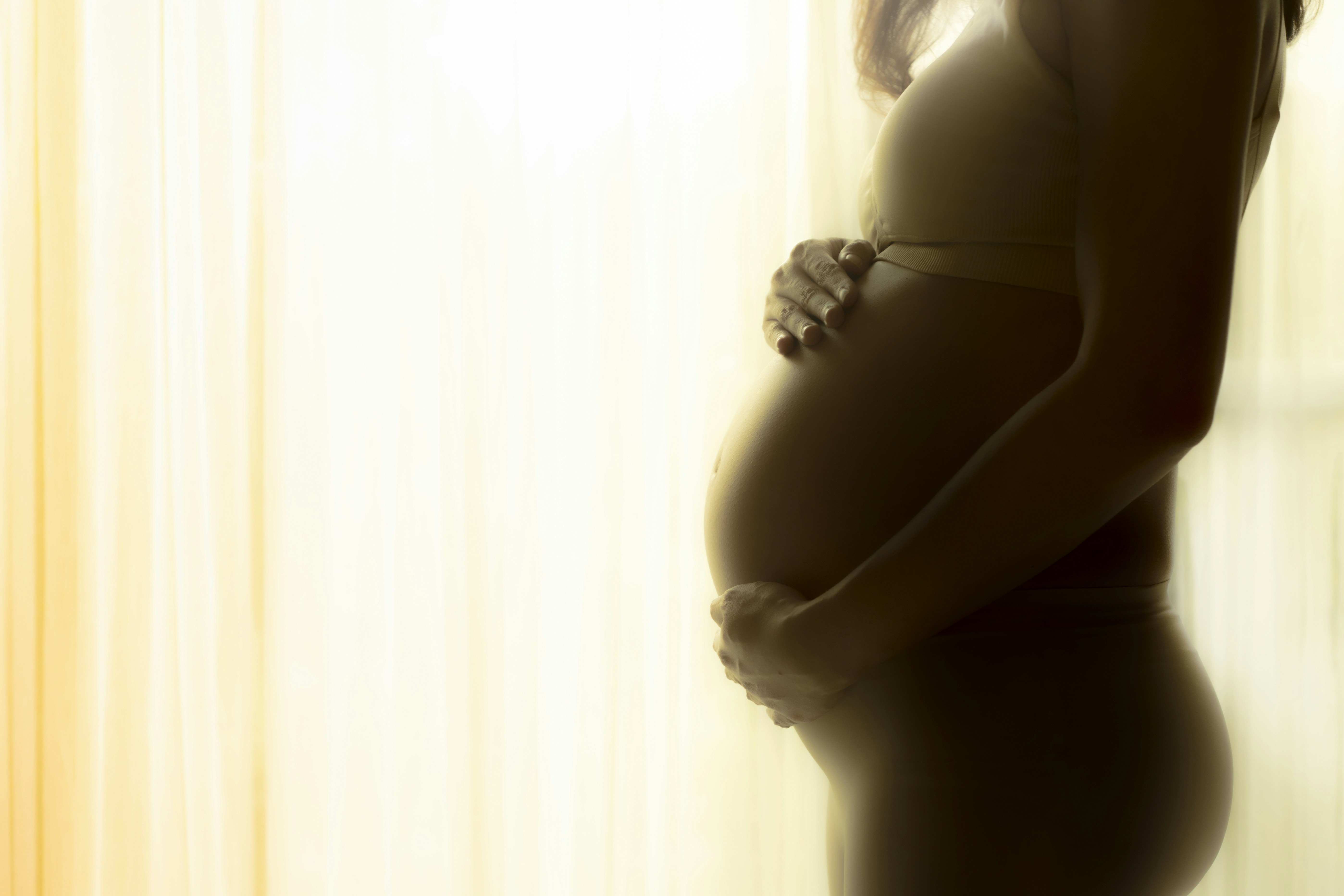 woman in black spaghetti strap top